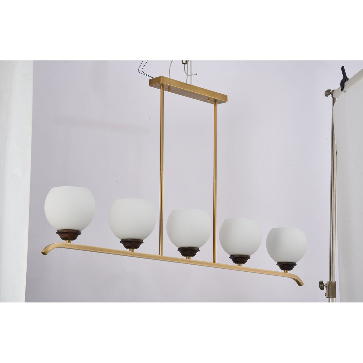 
Supplier real photograph of the unlit Avelune five-light linear chandelier complete front view