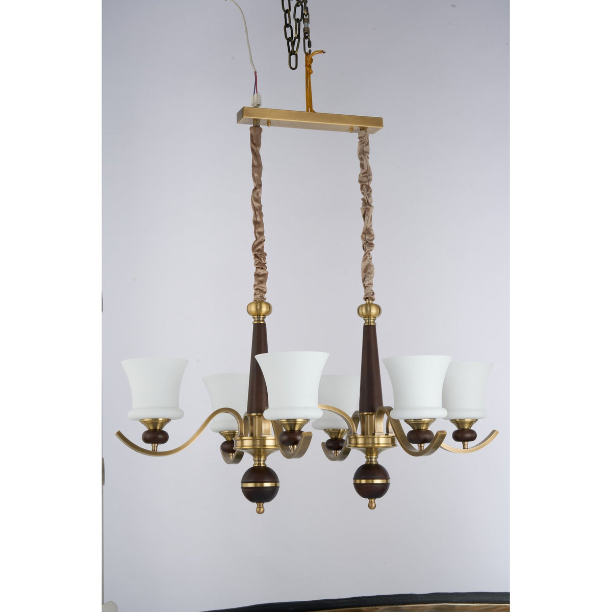 
Brontelle Opal Glass, Antique Brass and Ash Wood Linear Chandelier