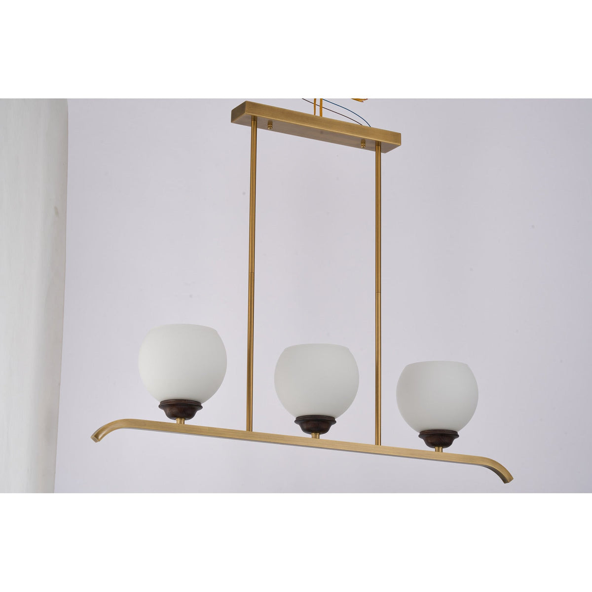 Supplier real photograph of the unlit Avelune three-light linear chandelier complete front view