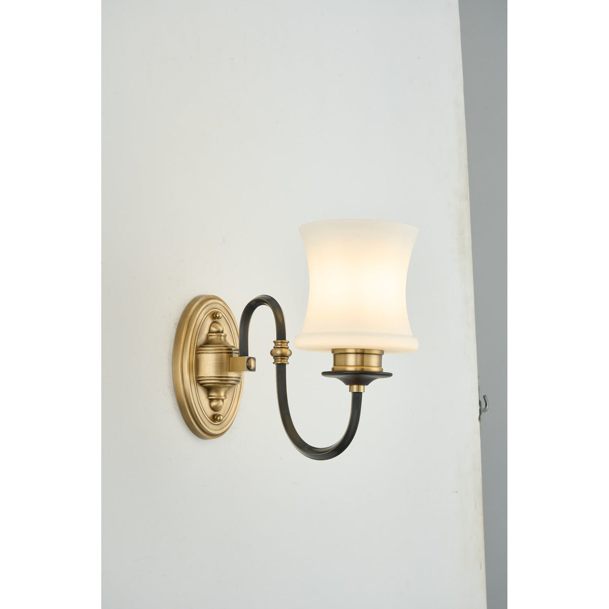
Ebonelle Opal Glass, Blackened Brass and Antique Brass Wall Sconce